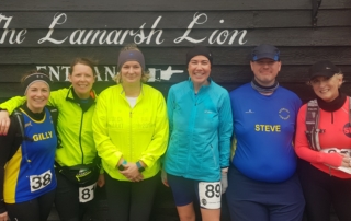 Clare Gillibrand, Sian Guyton, Sally Sandford, Tina O'Beirne, Steve Roberts and Sue Crawte after running 5 miles through the Essex countryside for the Larmarsh Lionheart race in gale-force winds.
