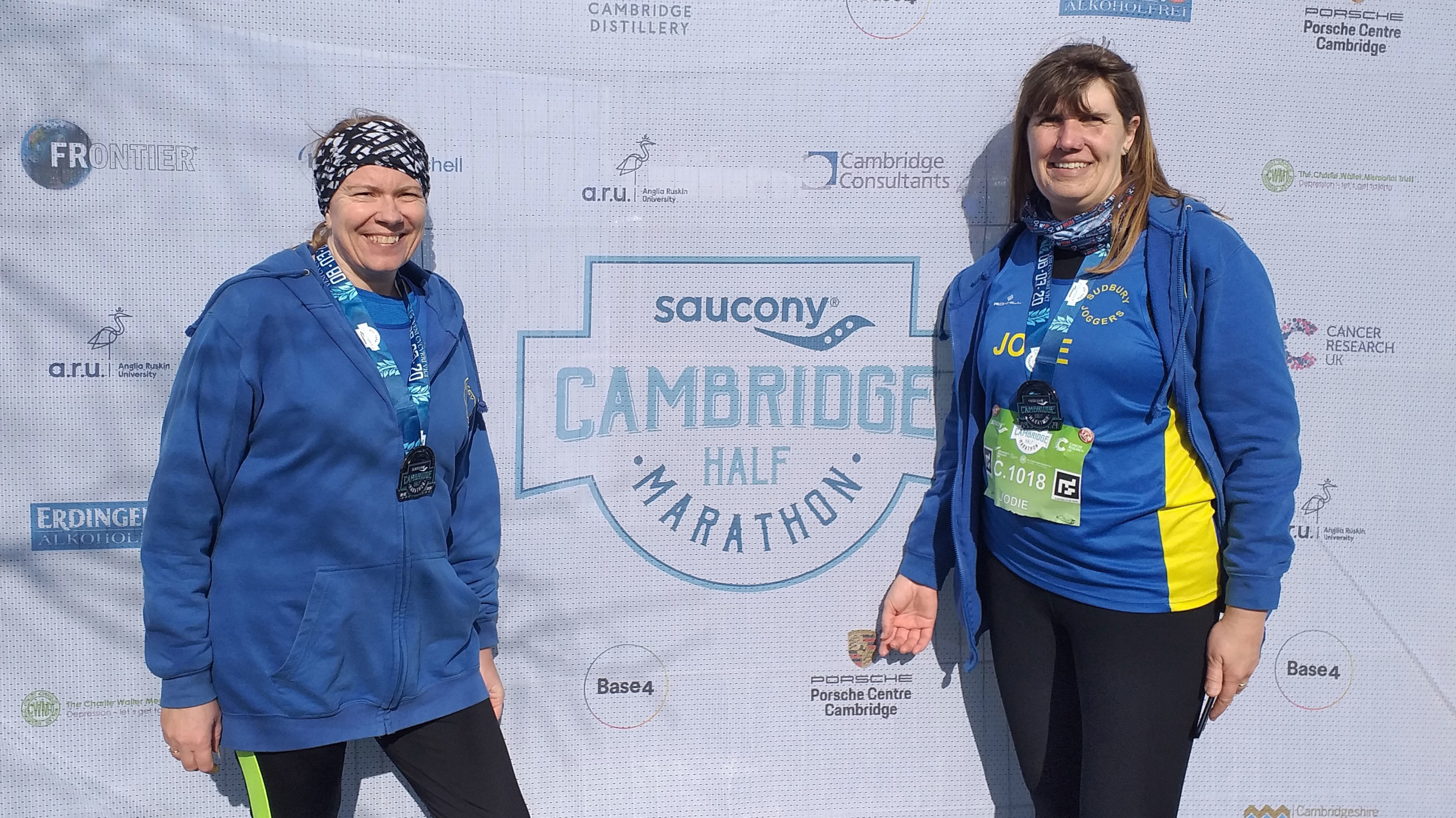 Claire Rooke (left) and Jodie Budd (right) after finishing the Cambridge Half Marathon.
